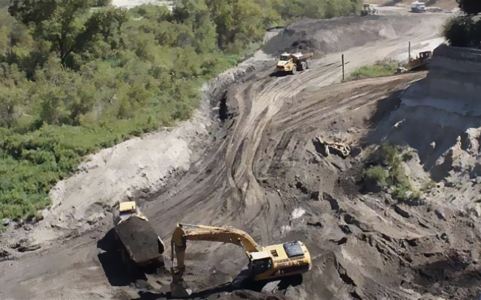 Construction equipment moving sediment