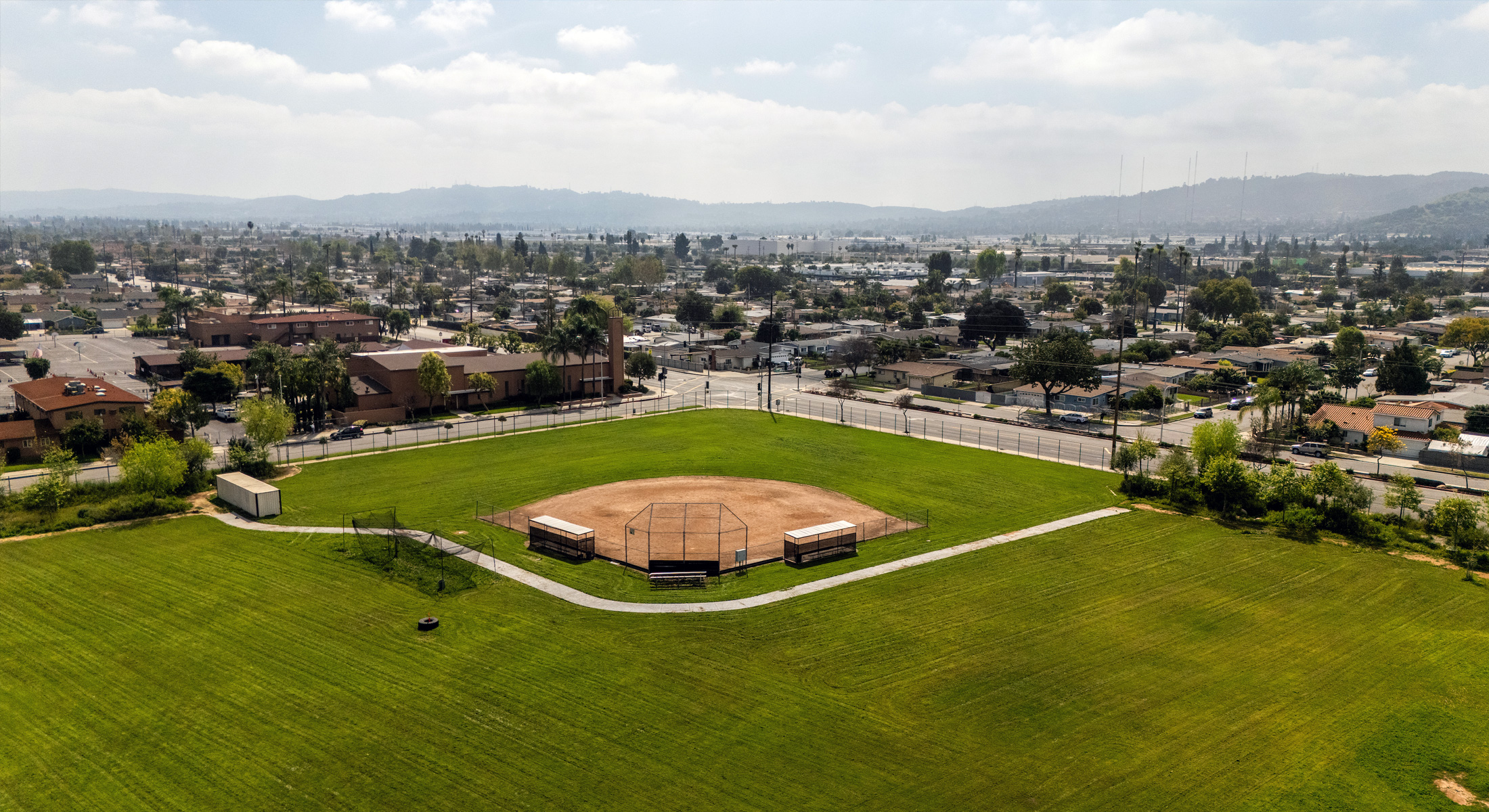 An aerial view of Bassett High School featuring expansive green sports fields that serve as a site for Multi-benefit water projects designed for regional stormwater capture.