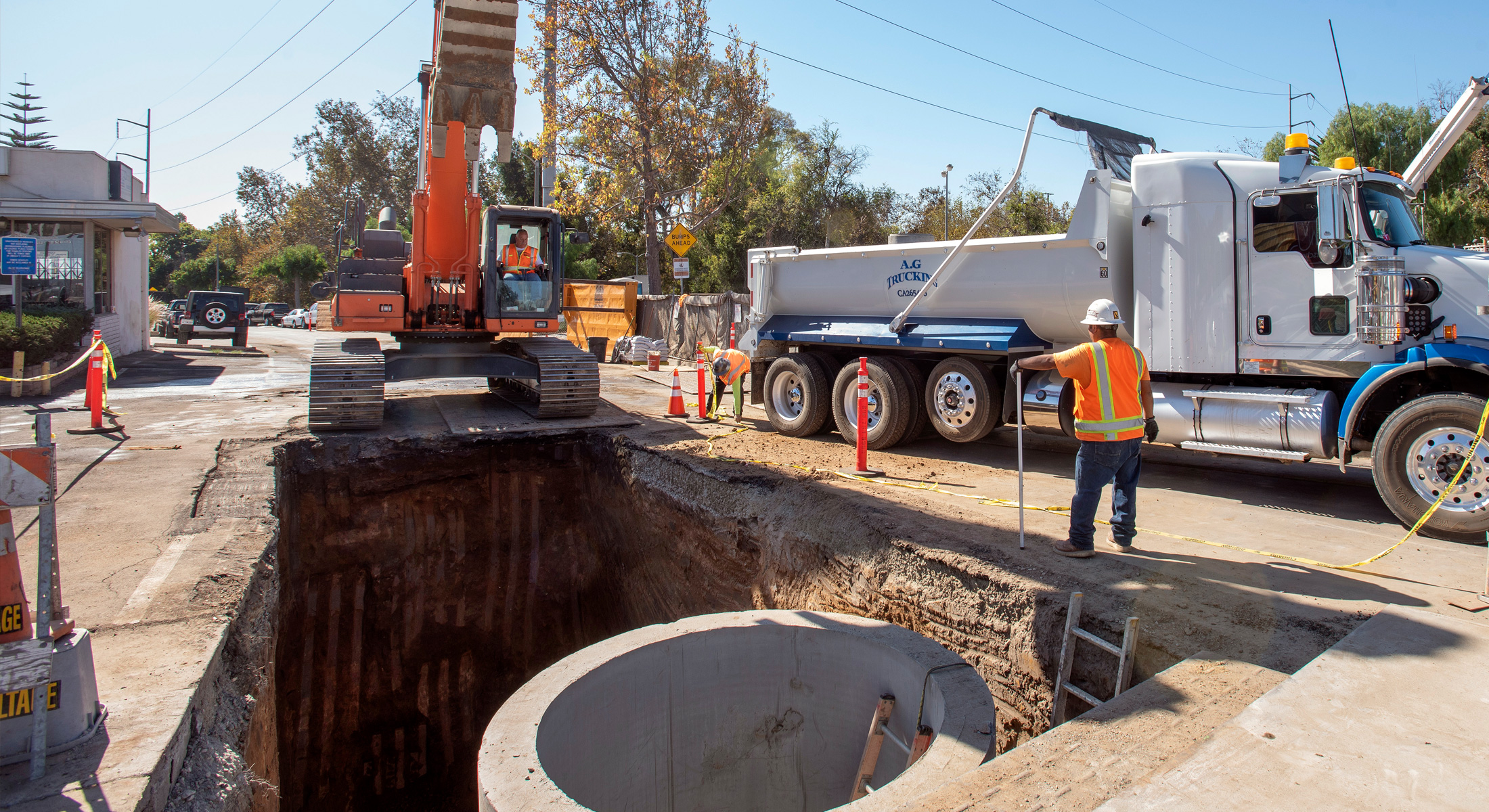Photo of workers installing a storm drain