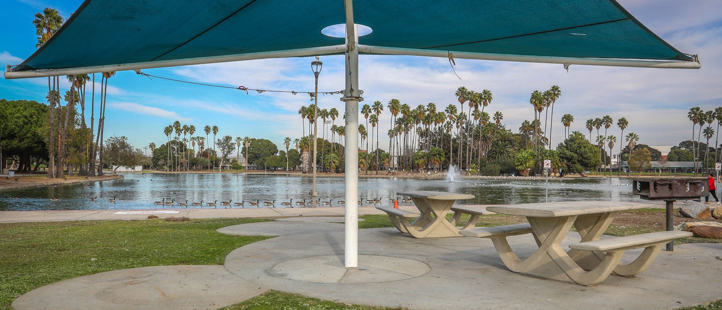 A view of the picnic tables and scenic lake at Alondra Park, one of the region's Multi-benefit water projects featuring an underground system to capture and treat local stormwater.