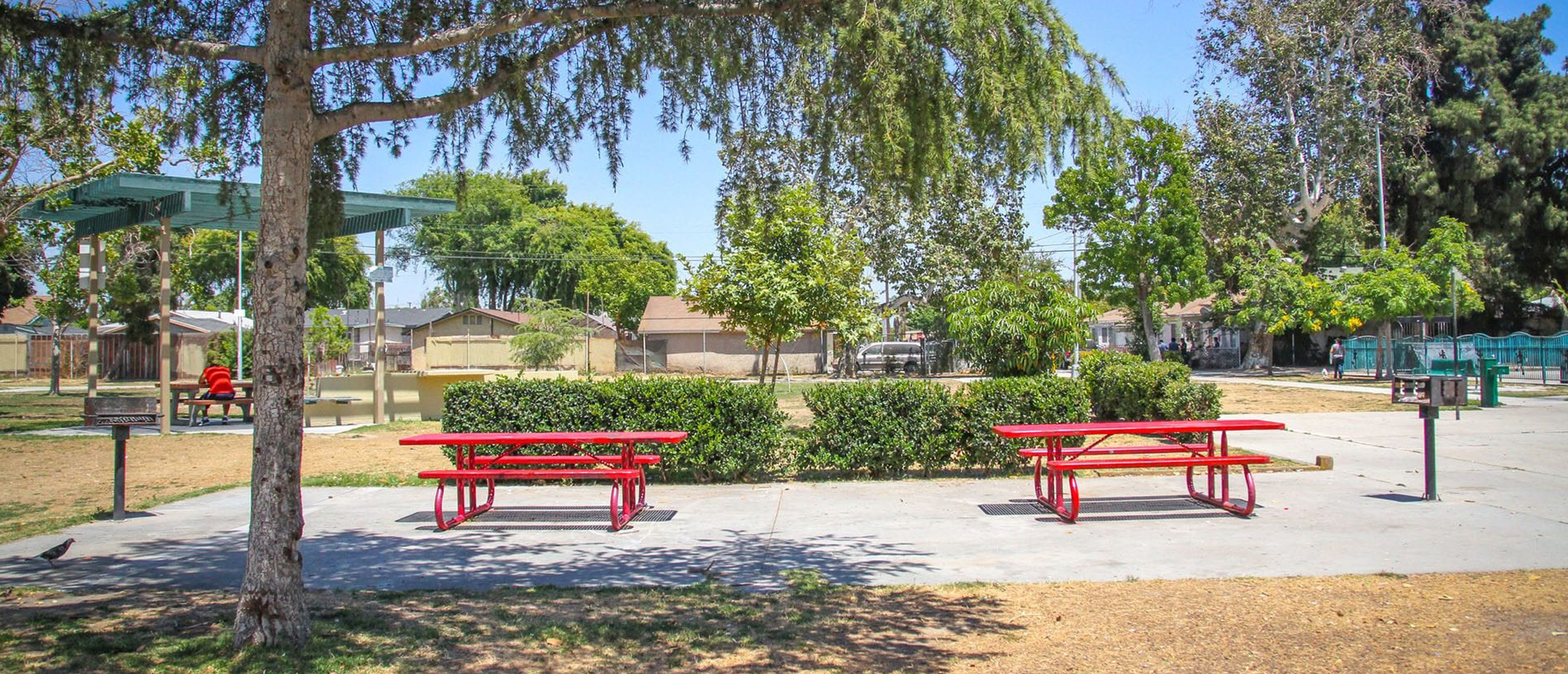 A wide view of the picnic areas and playground at Franklin D. Roosevelt Park, a site for Multi-benefit water projects that combine community recreation with regional stormwater capture.