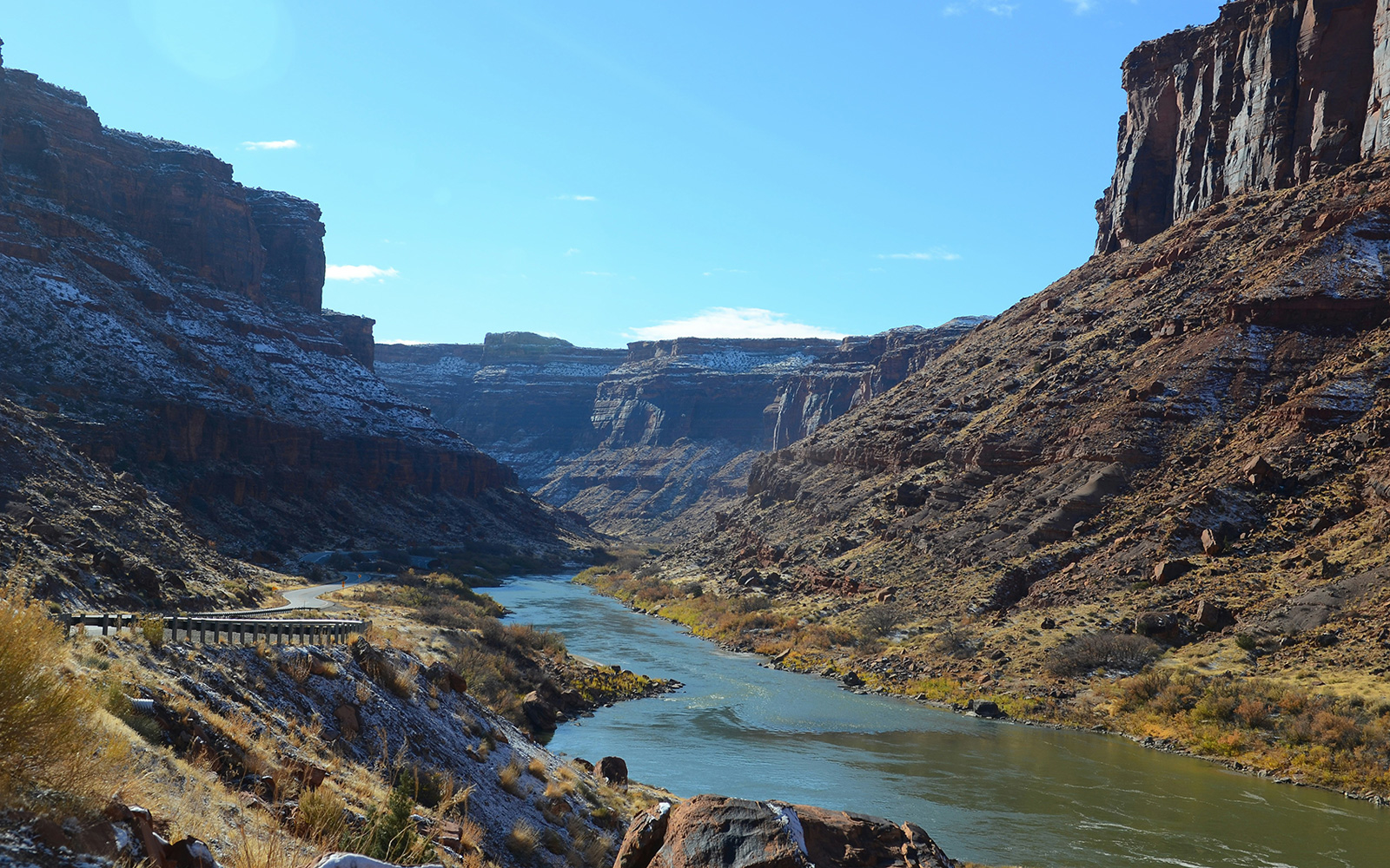 A photo of a river winding through a canyon